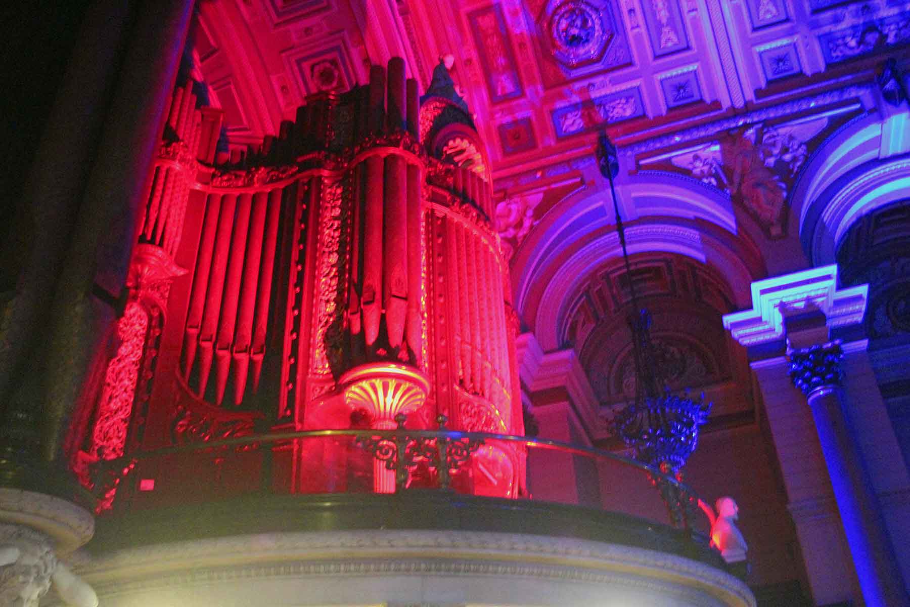 Image of St George's Hall in Liverpool with LED up-lighting lighting the massive organ.