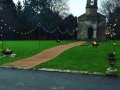 Festoon Lighting with low-level fire-pits for a winter\'s wedding.