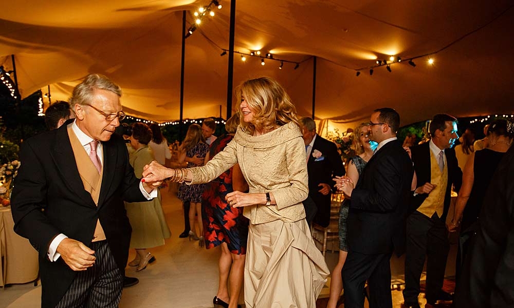 Image of a stretch marquee with people dancing.