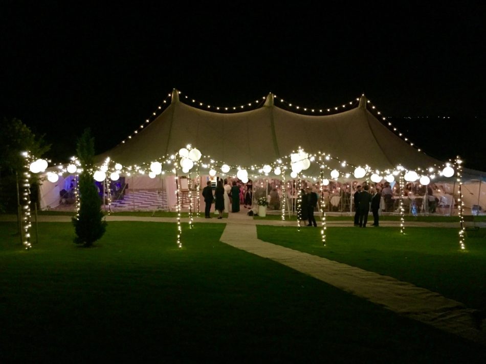 Image of a canvas marquee with fairy-light and festoon light canopy