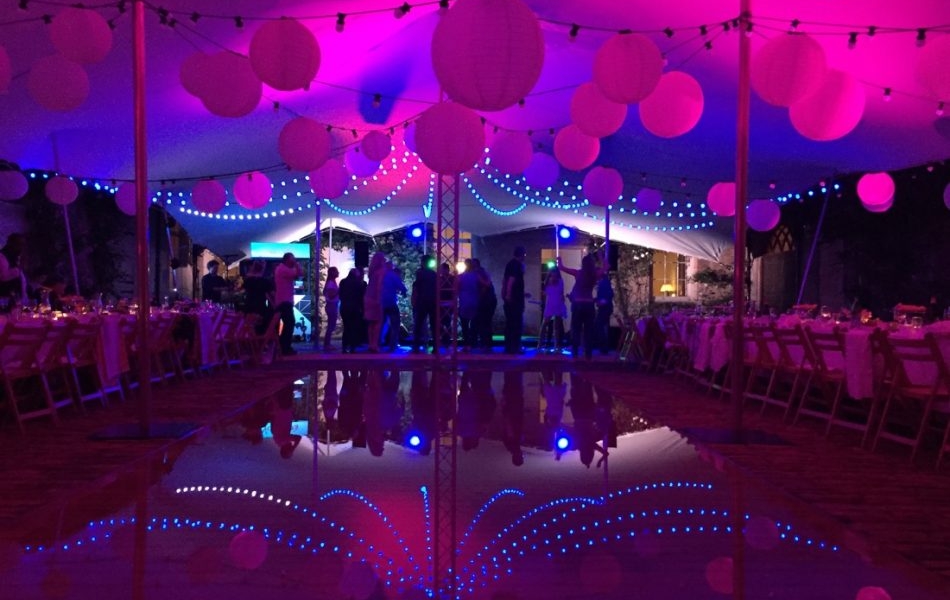 Pink stretch marquee with water feature.