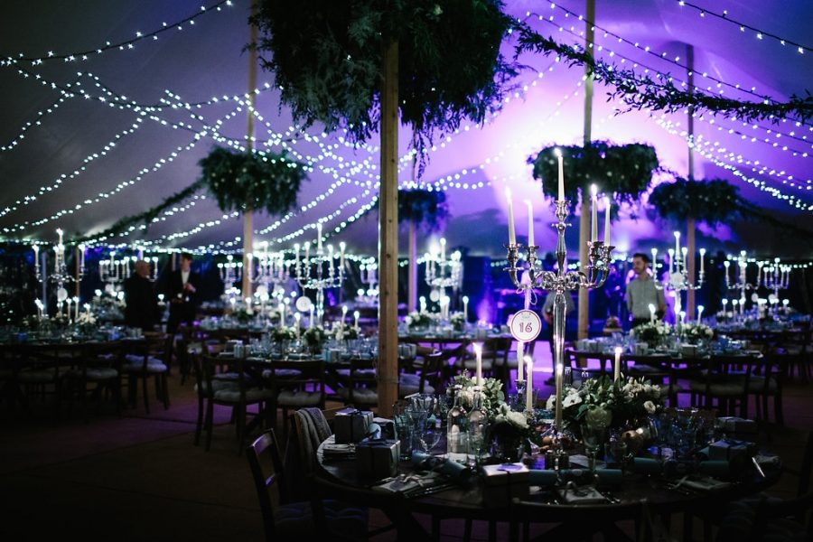 Image of a marquee interior with fairy-light canopy