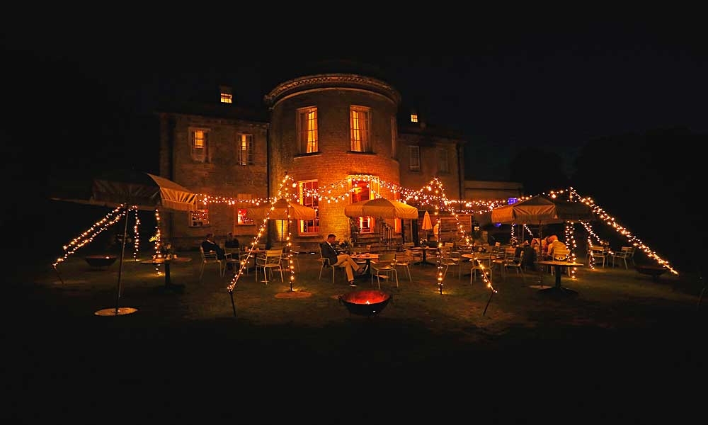 Babington House Bar Terrace with Chill Out Camp and 6 fire pits