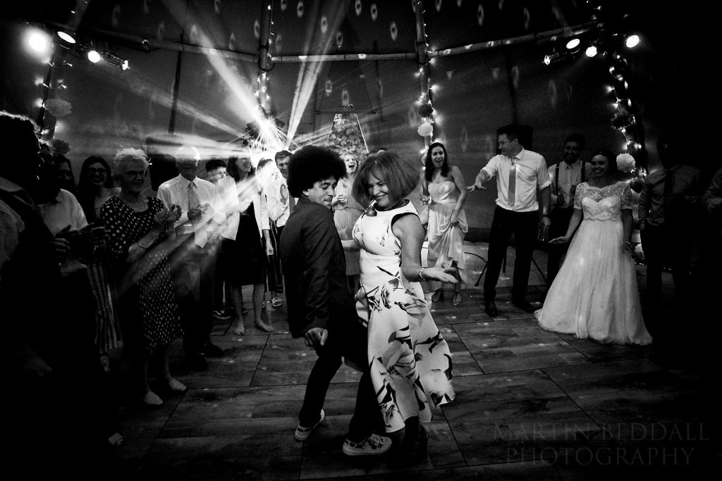 Wedding Tipi with DJ lighting and dancing